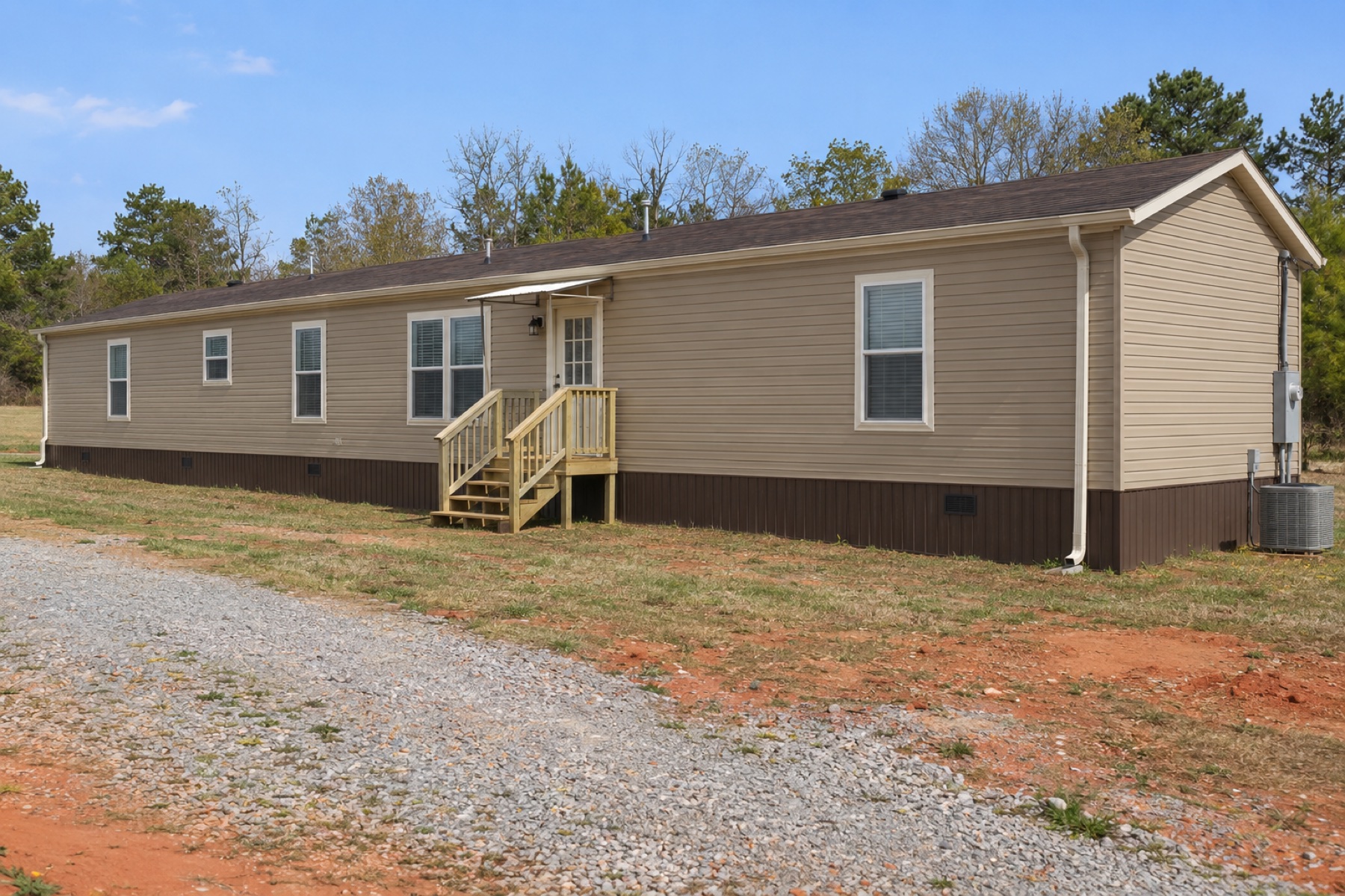 Realistic concept of the Trailside 924 tan single-wide mobile home on an Oklahoma residential lot