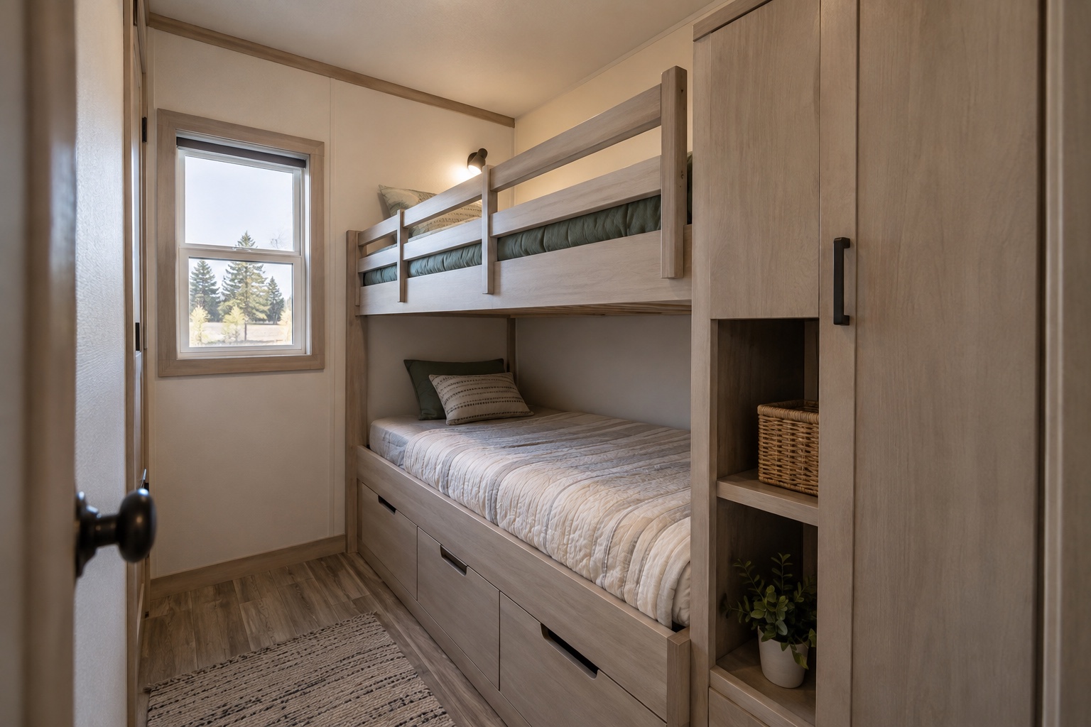 Compact bunk room with two built-in bunks and storage inside the Transit 448 mobile home